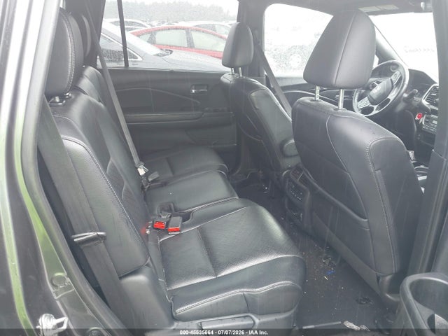 5FNYF8H02KB004642 Honda Passport Elite