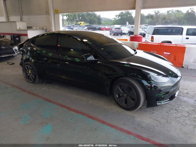 2023 5YJ3E1EA0PF697574 main image