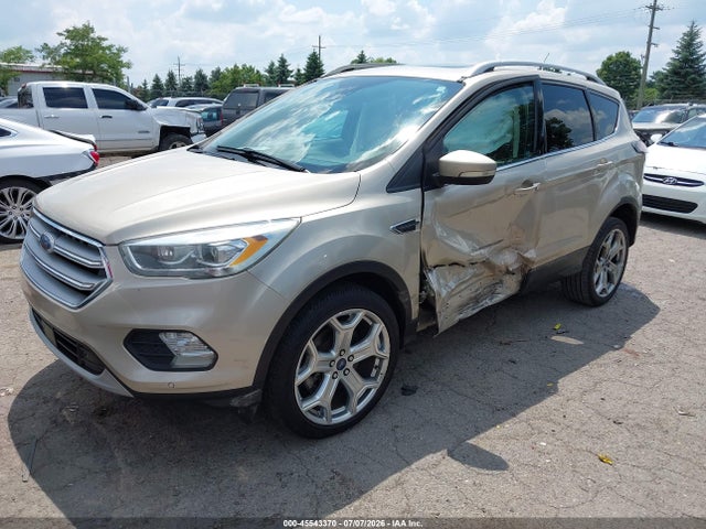 2017 Ford Escape Titanium მანქანა იყიდება აუქციონზე, vin: 1FMCU9JD2HUA87679, აუქციონის ნომერი: 45543370