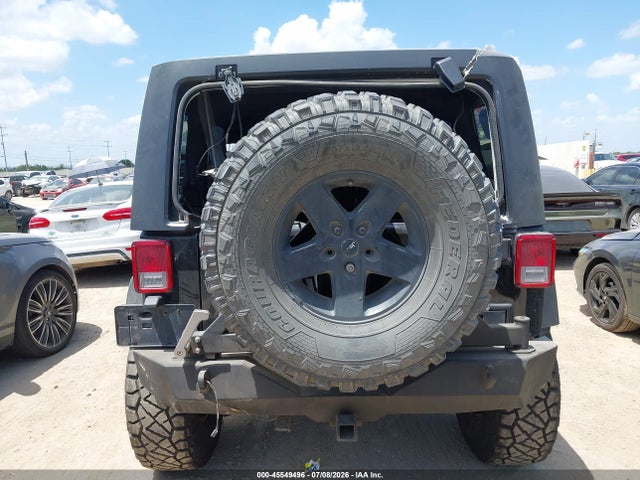 1C4BJWDG2EL244853 Jeep Wrangler Unlimited Sport