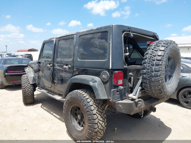 1C4BJWDG2EL244853 Jeep Wrangler Unlimited Sport
