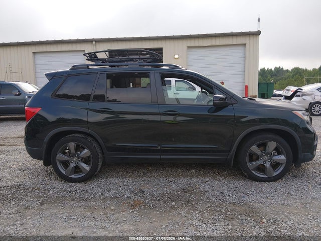 5FNYF7H9XKB010374 Honda Passport Touring