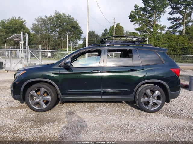 5FNYF7H9XKB010374 Honda Passport Touring
