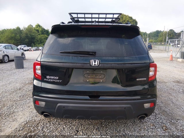 5FNYF7H9XKB010374 Honda Passport Touring