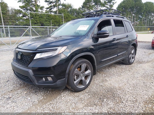 5FNYF7H9XKB010374 Honda Passport Touring