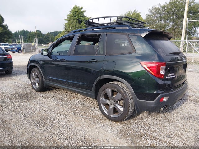 5FNYF7H9XKB010374 Honda Passport Touring