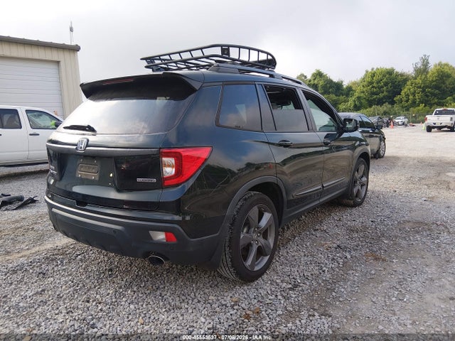 5FNYF7H9XKB010374 Honda Passport Touring