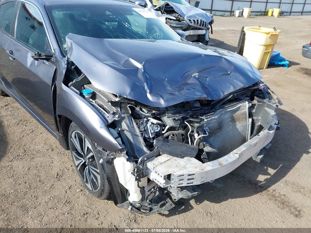 45561123 :رقم المزاد ، 19XFC2F89ME201743 vin ، 2021 Honda Civic Sport مزاد بيع