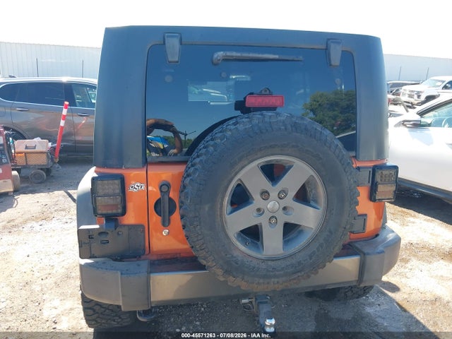 45571263 :رقم المزاد ، 1J4BA3H10AL206658 vin ، 2010 Jeep Wrangler Unlimited Sport مزاد بيع