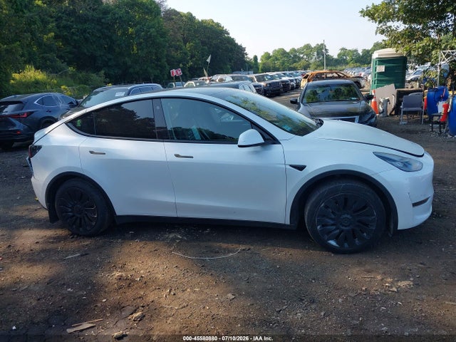 Продаж на аукціоні авто 2023 Tesla Model Y Awd/long Range Dual Motor All-wheel Drive, vin: 7SAYGDEE2PF615741, номер лоту: 45580880
