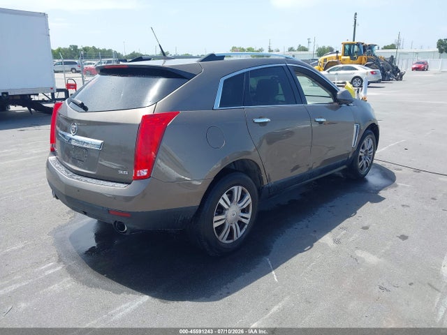 2014 Cadillac Srx Luxury Collection მანქანა იყიდება აუქციონზე, vin: 3GYFNEE3XES587233, აუქციონის ნომერი: 45591243