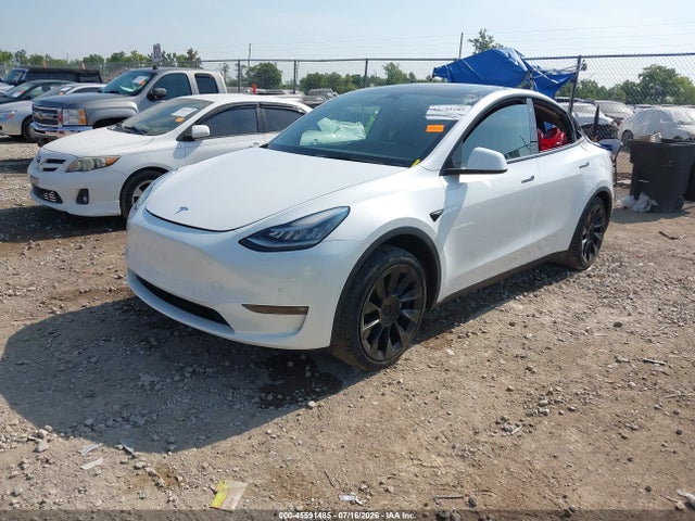 Продаж на аукціоні авто 2021 Tesla Model Y Standard Range Rear-wheel Drive, vin: 5YJYGDED2MF105910, номер лоту: 45591485