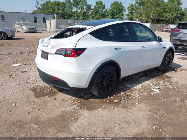 Продаж на аукціоні авто 2021 Tesla Model Y Standard Range Rear-wheel Drive, vin: 5YJYGDED2MF105910, номер лоту: 45591485