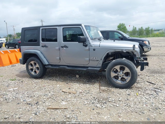 1C4HJWEG4JL900652 Jeep Wrangler Jk Unlimited Sahara