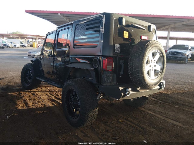1C4BJWDG8GL183544 Jeep Wrangler Unlimited Sport