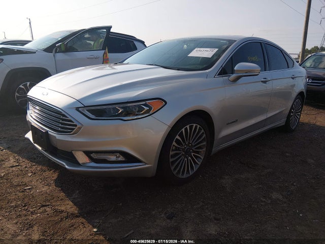 2017 Ford Fusion Hybrid Titanium მანქანა იყიდება აუქციონზე, vin: 3FA6P0RU4HR323075, აუქციონის ნომერი: 45625629