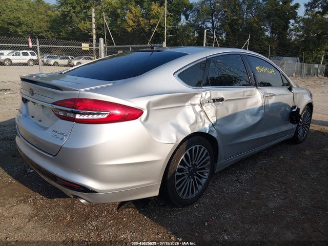 2017 Ford Fusion Hybrid Titanium მანქანა იყიდება აუქციონზე, vin: 3FA6P0RU4HR323075, აუქციონის ნომერი: 45625629