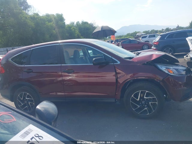 2HKRM4H44GH619594 Honda CR-V SE