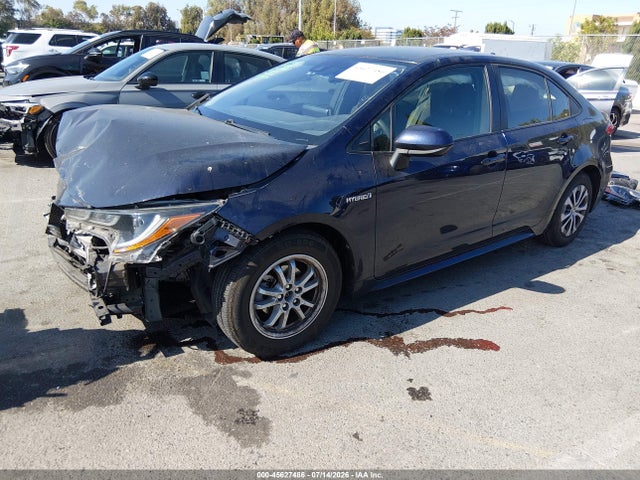 Toyota Corolla Hybrid Le 2021 JTDEAMDE4MJ004701 Image 2