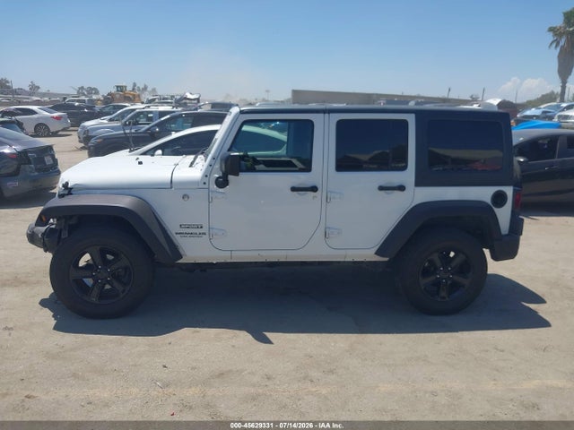 1C4BJWDG8GL266018 Jeep Wrangler Unlimited Sport