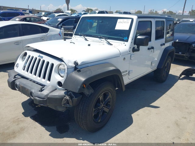1C4BJWDG8GL266018 Jeep Wrangler Unlimited Sport