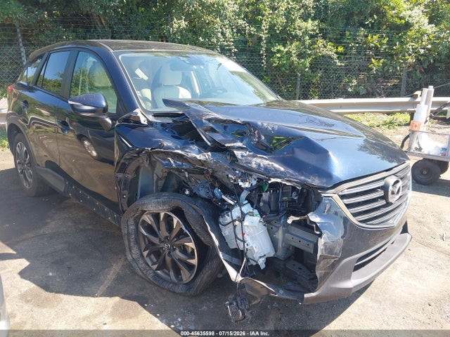 2016 Mazda Cx-5 Grand Touring მანქანა იყიდება აუქციონზე, vin: JM3KE2DY9G0763481, აუქციონის ნომერი: 45635598