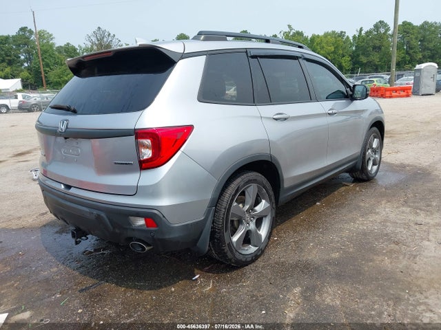 5FNYF7H96MB001951 Honda Passport 2wd Touring