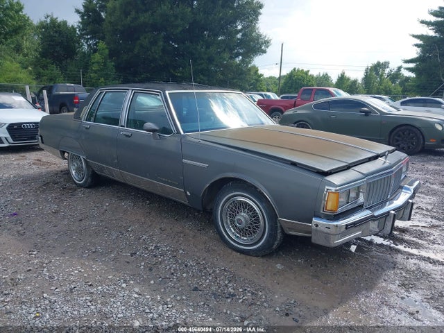 1986 Pontiac Parisienne Brougham მანქანა იყიდება აუქციონზე, vin: 1G2BT69Y9GX271480, აუქციონის ნომერი: 45640494