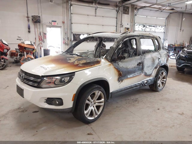 2013 Volkswagen Tiguan Sel მანქანა იყიდება აუქციონზე, vin: WVGBV3AX0DW057840, აუქციონის ნომერი: 45650326