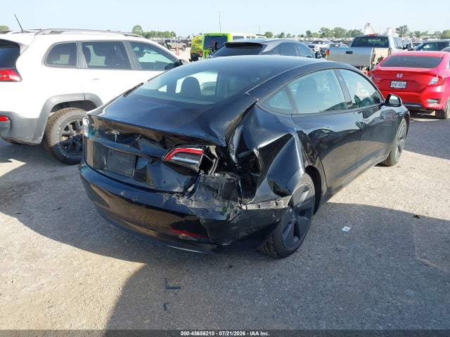 Tesla Model 3 Standard Range Plus Rear-wheel Drive 2021 5YJ3E1EA8MF986083 Image 4
