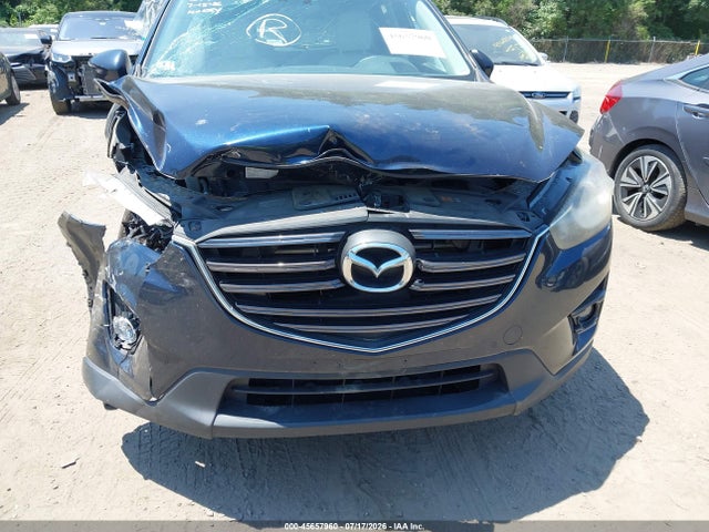 2016 Mazda Cx-5 Grand Touring მანქანა იყიდება აუქციონზე, vin: JM3KE4DY4G0780328, აუქციონის ნომერი: 45657960
