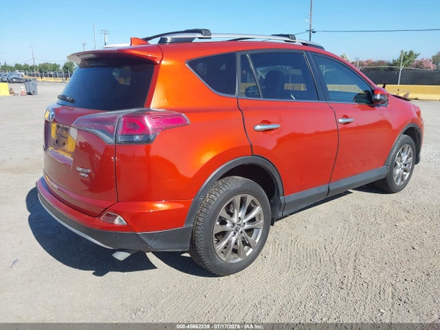 JTMDFREV9GJ073803 Toyota Rav4 Limited
