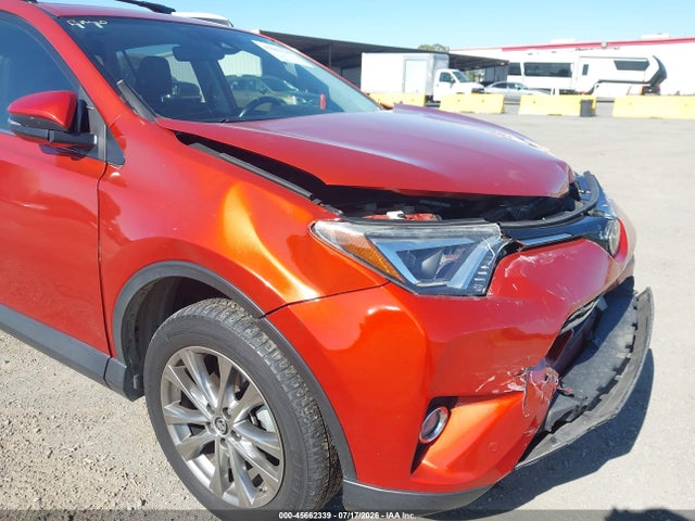 JTMDFREV9GJ073803 Toyota Rav4 Limited