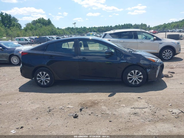 JTDL9RFU0L3013884 Toyota Prius Le Awd-e