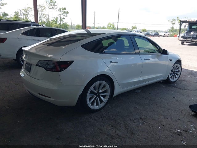 Tesla Model 3 Standard Range Plus Rear-wheel Drive 2021 5YJ3E1EA8MF856708 Image 4