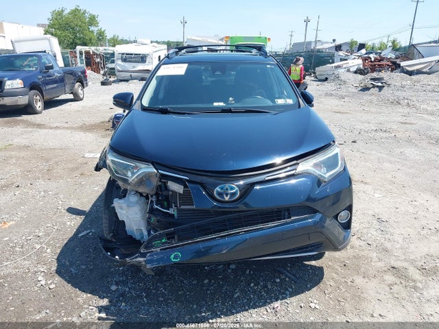 JTMRJREVXJD232936 Toyota Rav4 Hybrid Xle