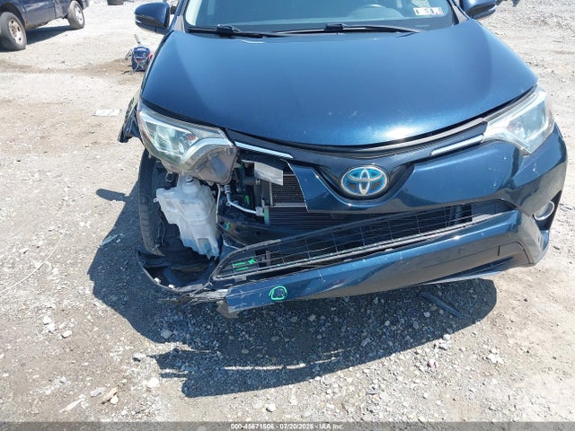 JTMRJREVXJD232936 Toyota Rav4 Hybrid Xle