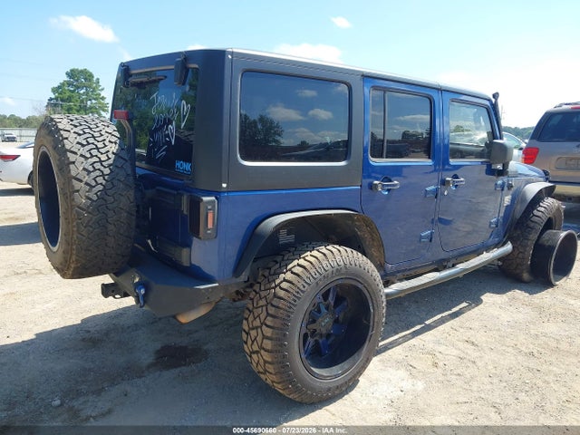 2009 Jeep Wrangler Unlimited Sahara მანქანა იყიდება აუქციონზე, vin: 1J4GA59199L781644, აუქციონის ნომერი: 45690660
