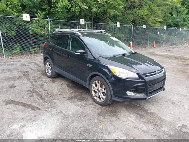 Auction sale of the 2016 Ford Escape Titanium, vin: 1FMCU9JX4GUB10257, lot number: 45692042