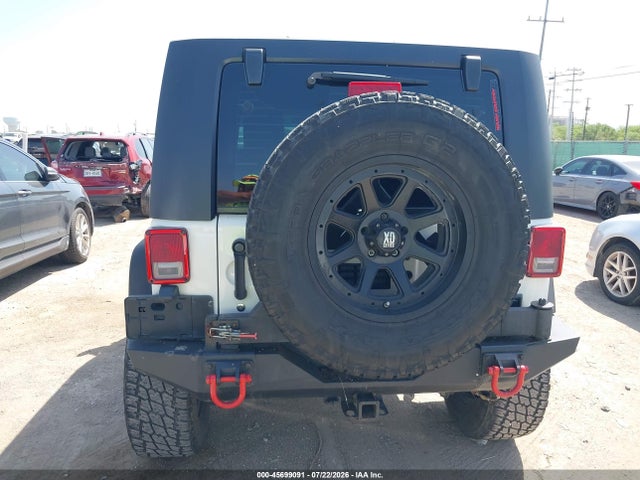 45699091 :رقم المزاد ، 1J4BA3H17AL105150 vin ، 2010 Jeep Wrangler Unlimited Sport مزاد بيع