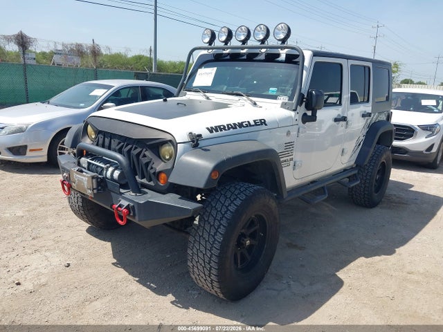 45699091 :رقم المزاد ، 1J4BA3H17AL105150 vin ، 2010 Jeep Wrangler Unlimited Sport مزاد بيع