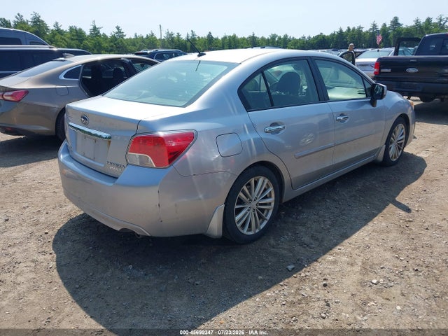 JF1GJAG67EH018909 Subaru Impreza 2.0i Limited