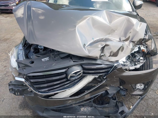 2016 Mazda Cx-5 Grand Touring მანქანა იყიდება აუქციონზე, vin: JM3KE4DY4G0904484, აუქციონის ნომერი: 45703134