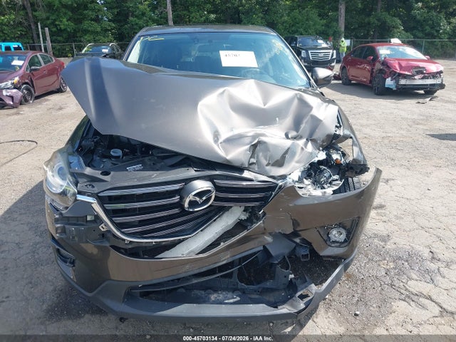 2016 Mazda Cx-5 Grand Touring მანქანა იყიდება აუქციონზე, vin: JM3KE4DY4G0904484, აუქციონის ნომერი: 45703134
