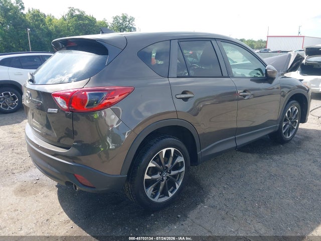 2016 Mazda Cx-5 Grand Touring მანქანა იყიდება აუქციონზე, vin: JM3KE4DY4G0904484, აუქციონის ნომერი: 45703134