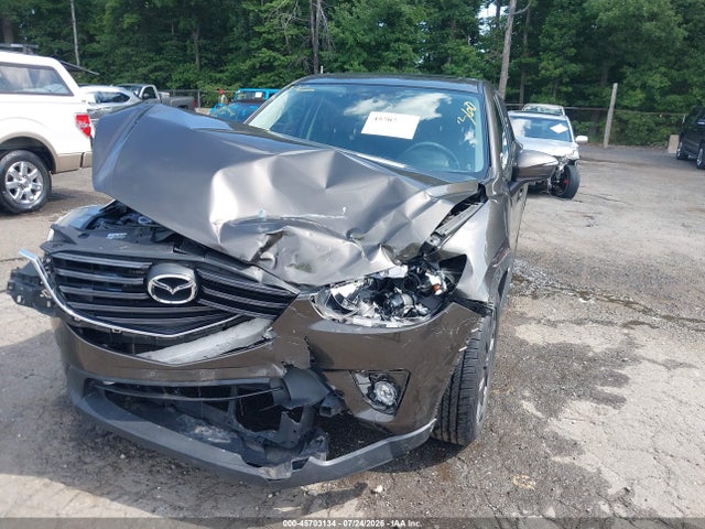 2016 Mazda Cx-5 Grand Touring მანქანა იყიდება აუქციონზე, vin: JM3KE4DY4G0904484, აუქციონის ნომერი: 45703134