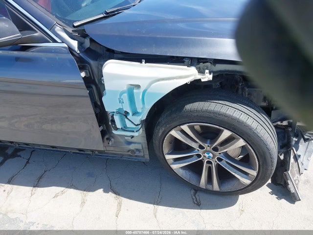 WBA3C1C5XFP851057 BMW 328I