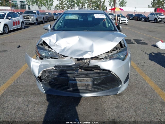 2T1BURHE9JC037783 Toyota COROLLA LE