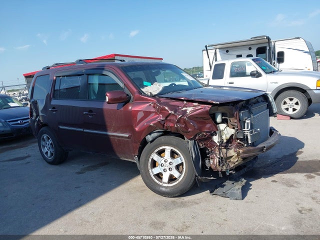 2011 Honda Pilot Touring მანქანა იყიდება აუქციონზე, vin: 5FNYF4H9XBB072601, აუქციონის ნომერი: 45710580