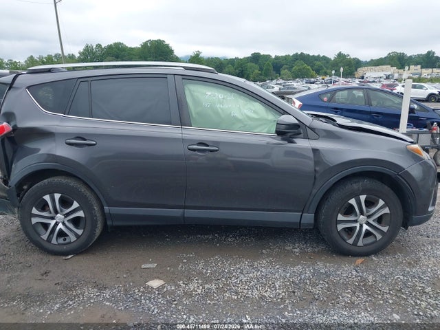 JTMZFREV0JJ154590 Toyota RAV4 LE